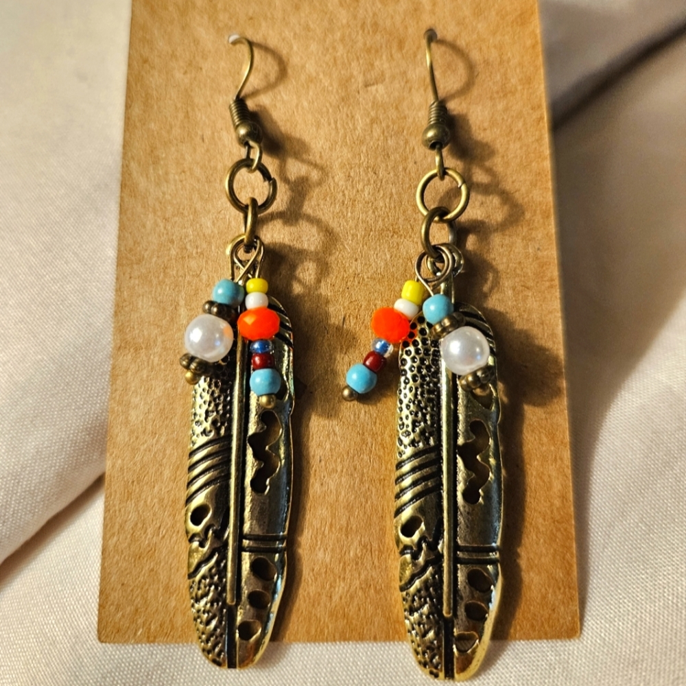 Antique bronze and bed dangle earrings